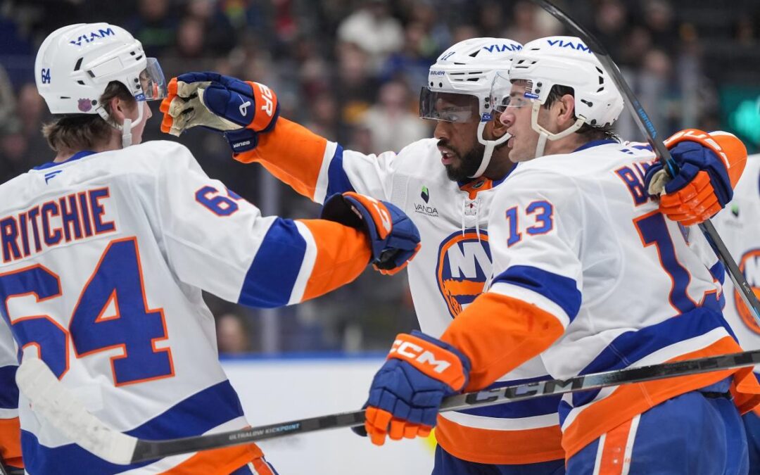 Islanders grind out win over lowly Canucks in messy performance