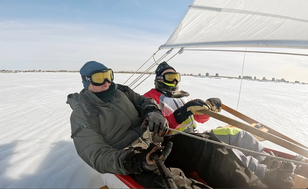 Freezing cold means fun times for Queens ice sailors