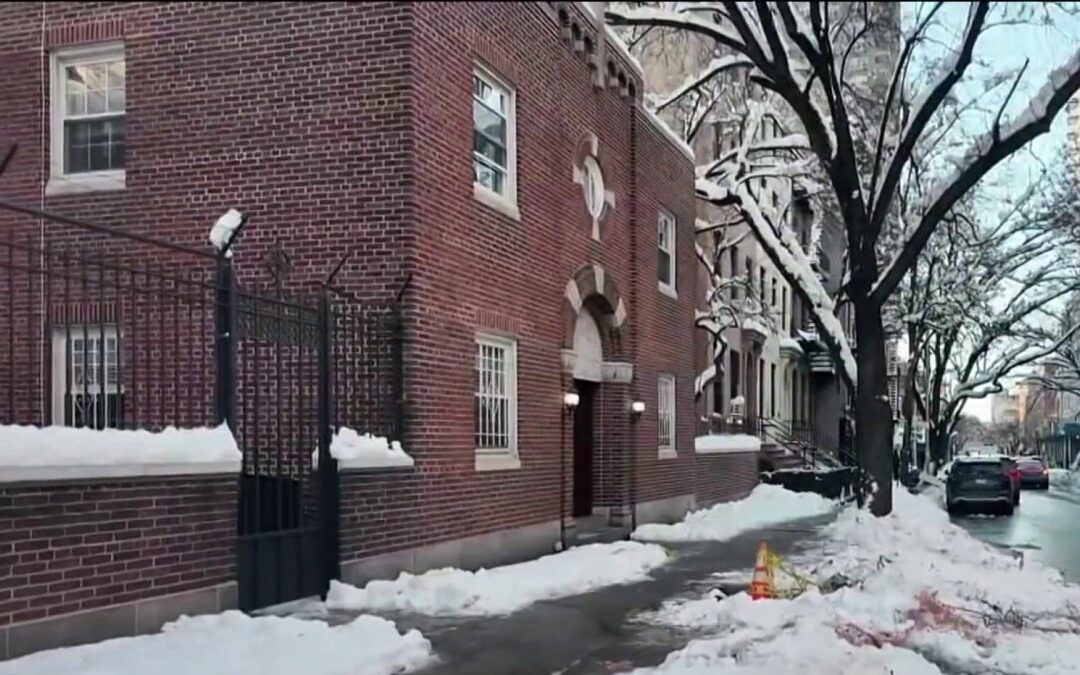 Falling tree narrowly misses nun and child on Hell's Kitchen sidewalk