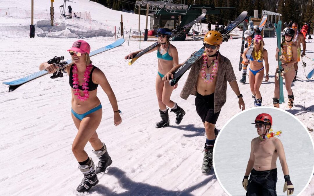 In record heat, US ski resorts bulldoze snow — skiers wear bikinis