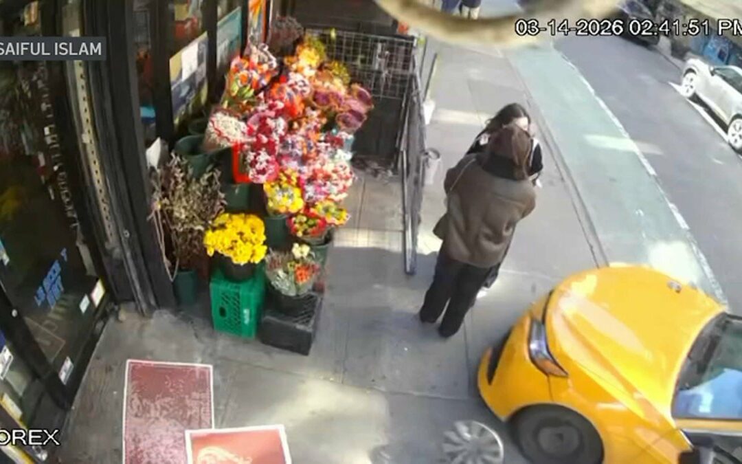 Taxi strikes two women standing on sidewalk