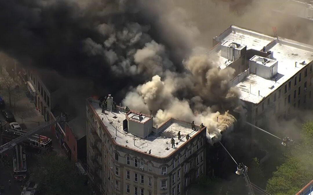 At least 1 killed in fire at Bronx apartment building, officials say
