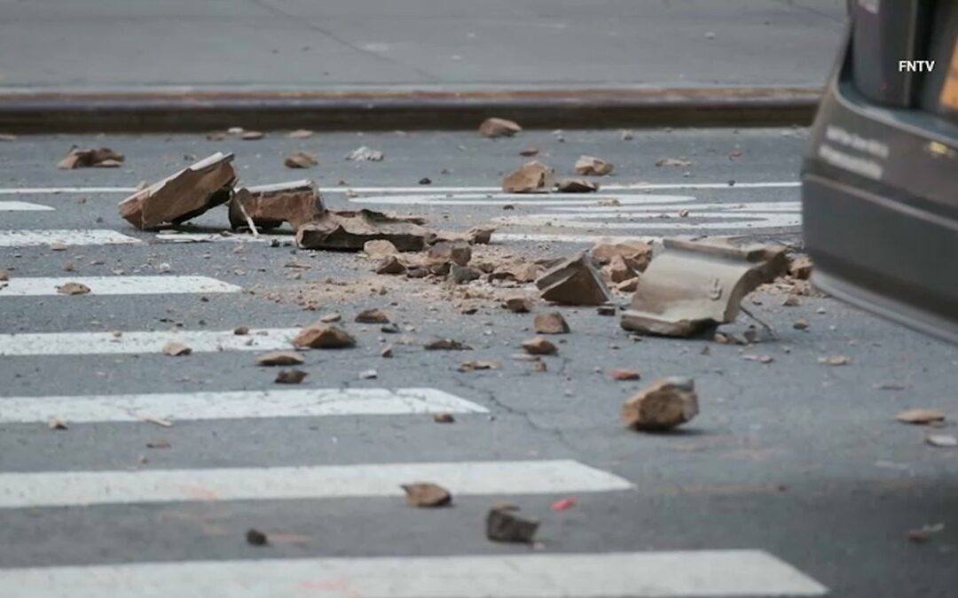 Chunks of stone and façade fall from Manhattan high-rise onto cars and street below