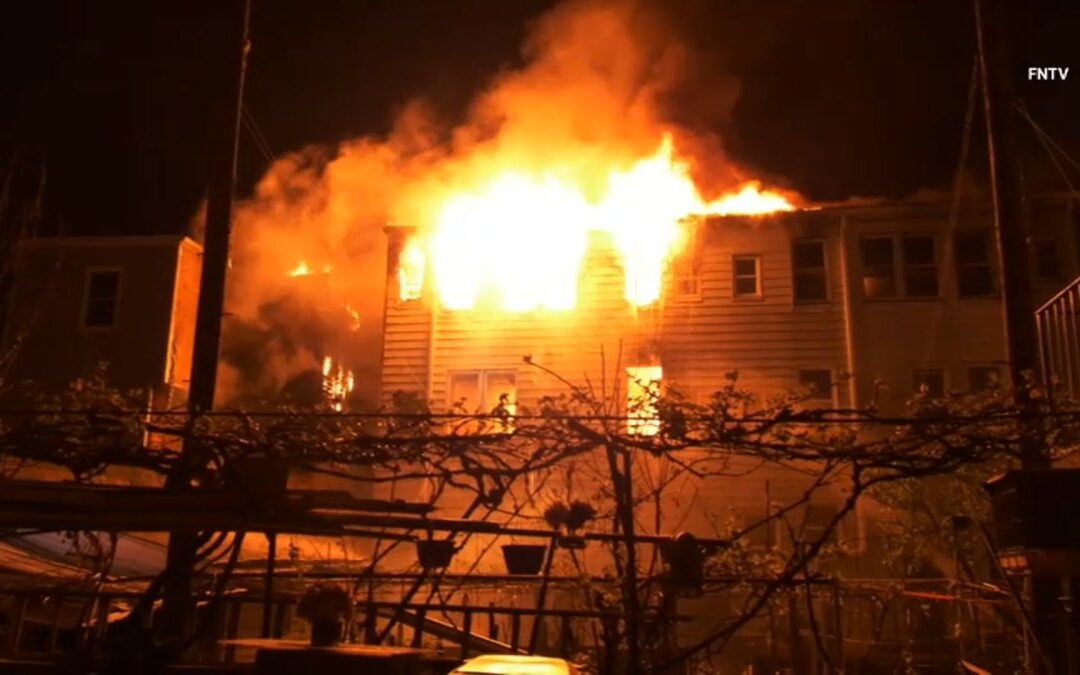 Several firefighters injured battling massive Newark fire