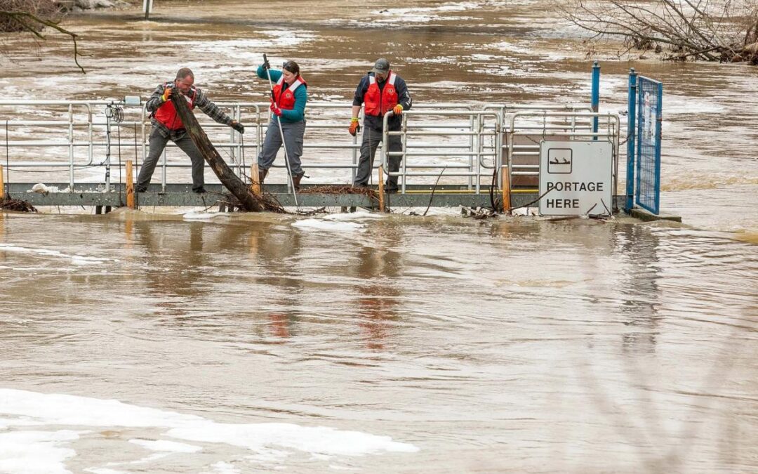 Midwestern drivers trapped in flooded streets after destructive tornadoes, record rainfall