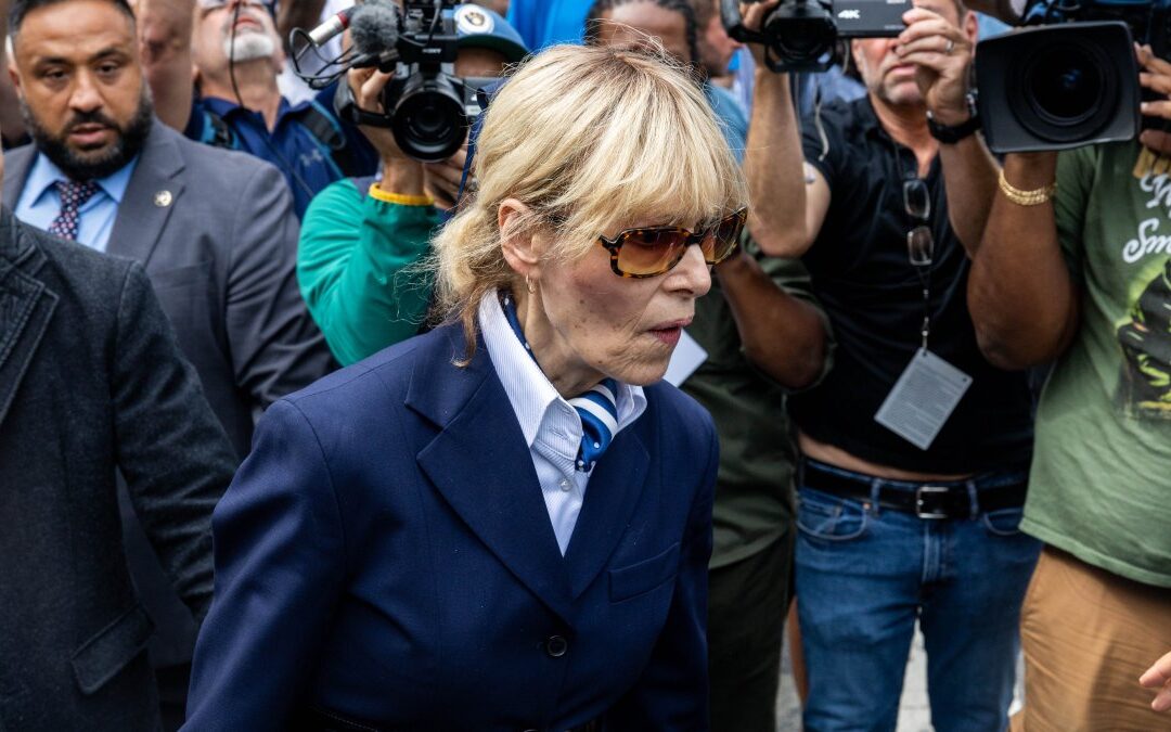 Justice Department opens criminal probe into E. Jean Carroll