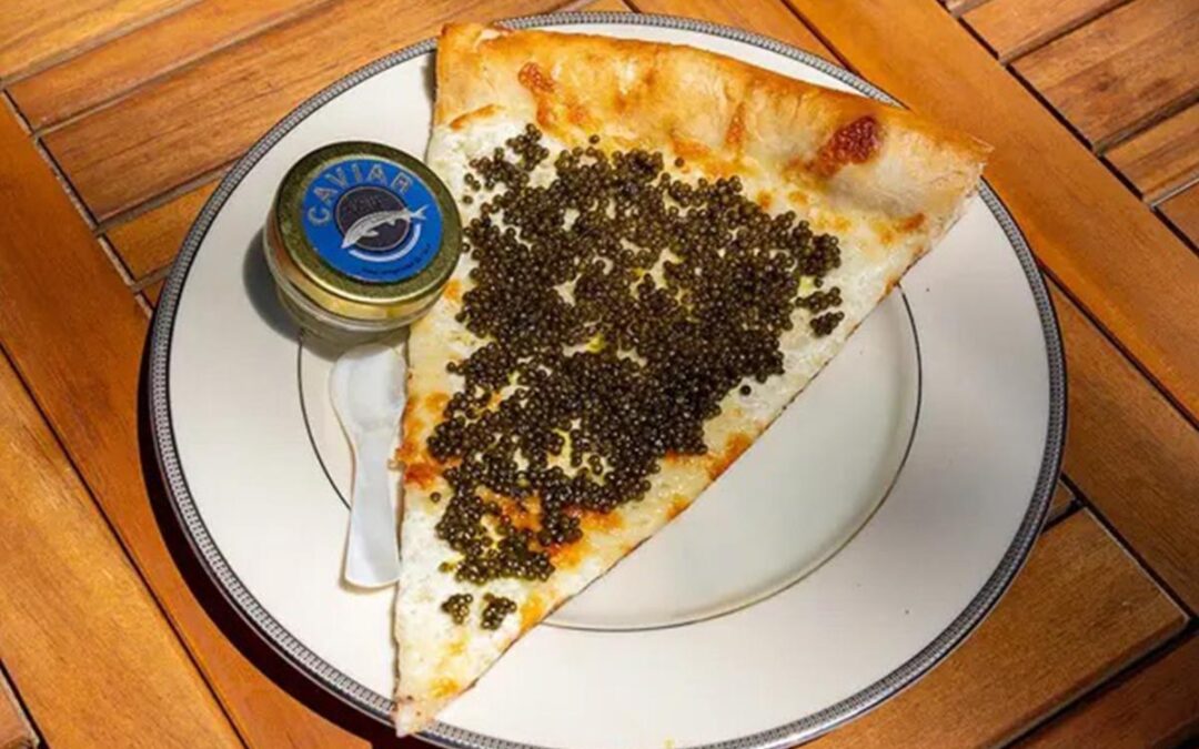 Philadelphia pizza shop sells $55 slices topped with caviar, served on gold plate with keepsake spoon