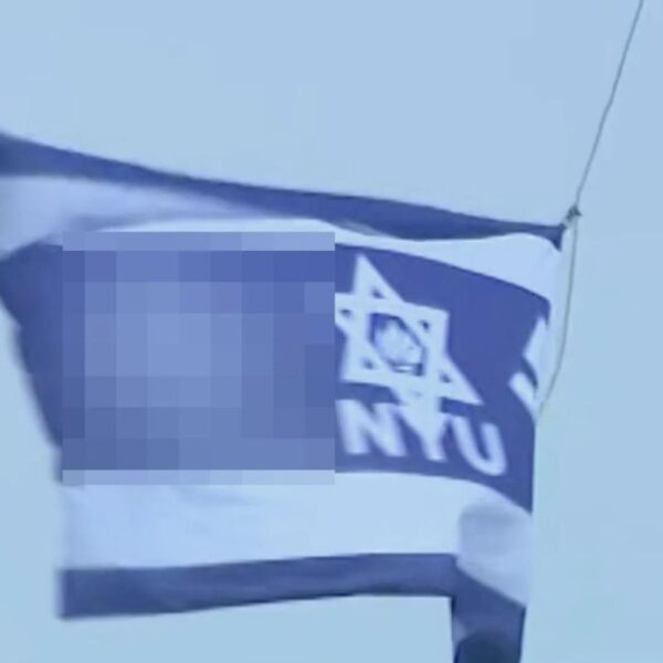 Swastika flag raised above NYU building named after billionaire Jewish causes donor during graduation week