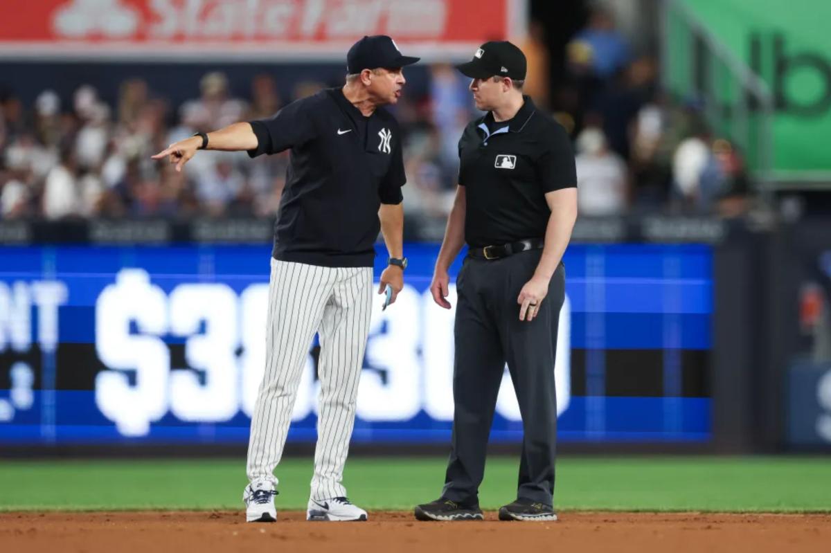 Aaron Boone ejected in fiery scene after controversial call with ‘savages in the f–king box’ umpire