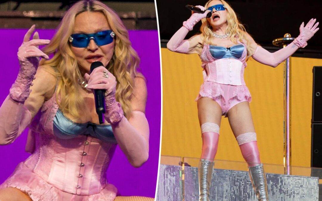 Madonna, 67, shocks in skintight pink corset at surprise NYC Times Square concert