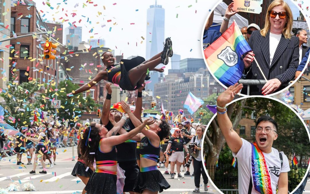NYPD commish stands with armed gay cops on sidelines of NYC Pride March after slamming organizers for barring them