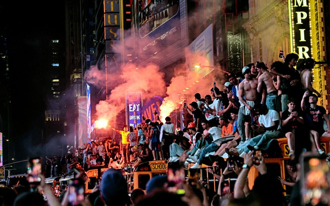 Mayhem mars euphoria as New York City celebrates the Knicks' first championship in 53 years