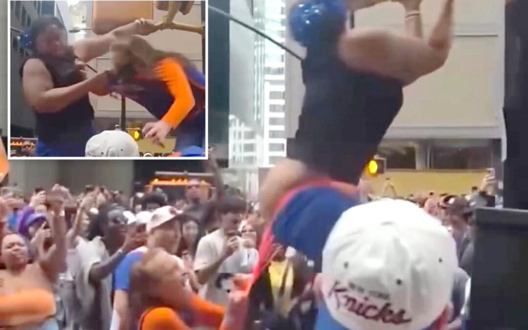Wild video shows cat fight over Knicks parade viewing spot as woman loses pants — then twerks in orange thong