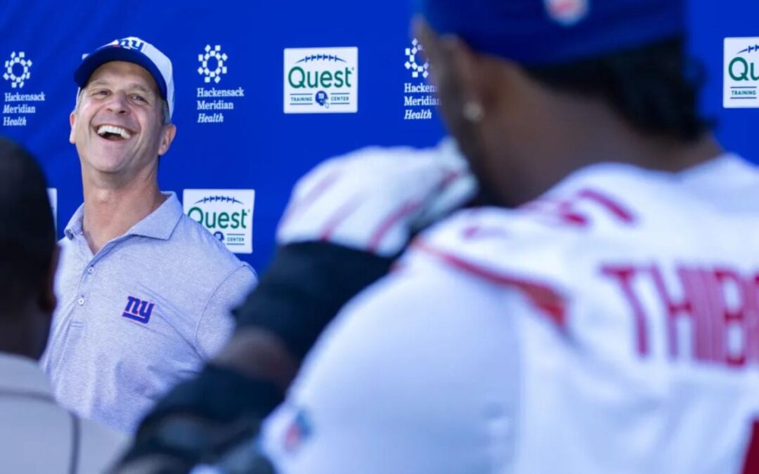Kayvon Thibodeaux has some fun with John Harbaugh during Giants press conference