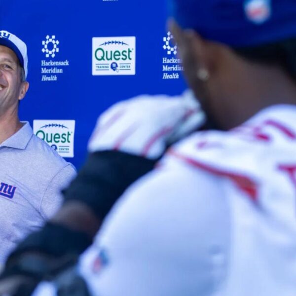 Kayvon Thibodeaux has some fun with John Harbaugh during Giants press conference