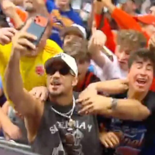 Josh Hart celebrates among fans during wild Knicks parade moment