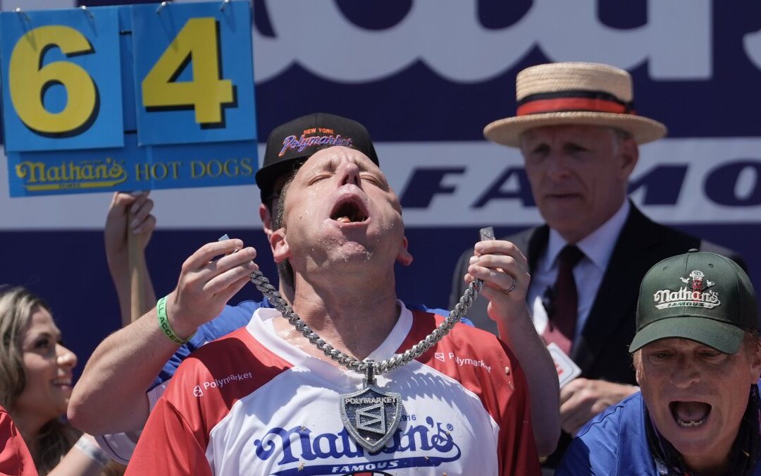 Joey Chestnut eats 66 hot dogs to again claim Mustard Belt at Nathan's Famous contest