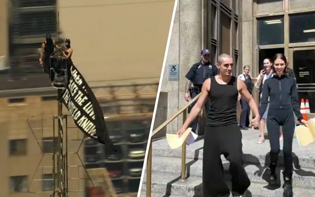 Daredevil couple embrace after court, charged with felony for scaling Empire State Building